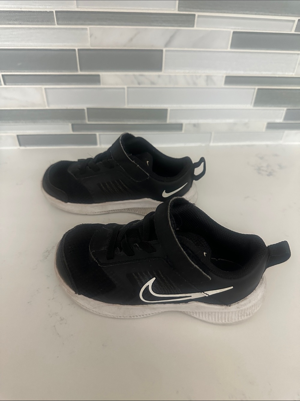 Kids Nike Downshifter black sneakers